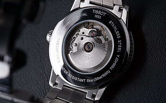 TISSOT(eB\)